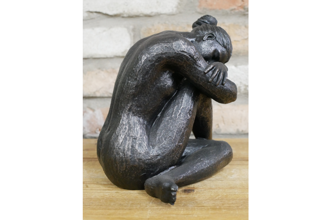 Statue Of Sitting Woman in aged antique black/bronze