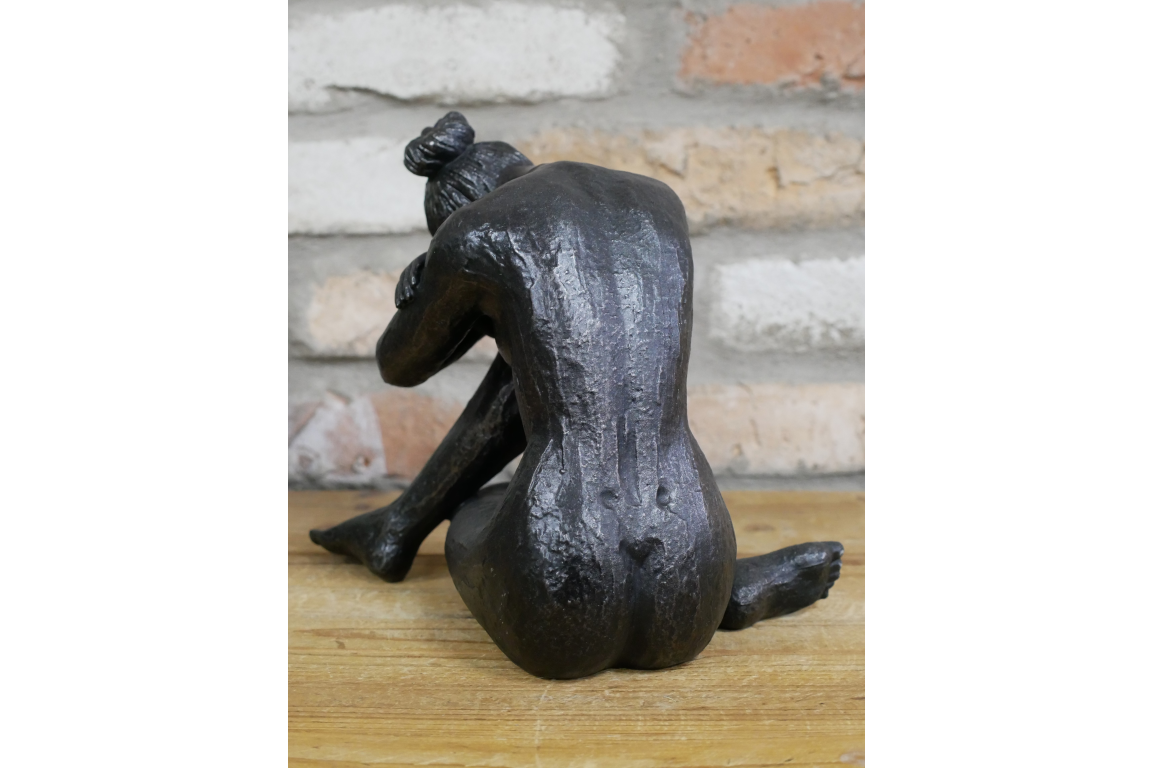 Statue Of Sitting Woman in aged antique black/bronze