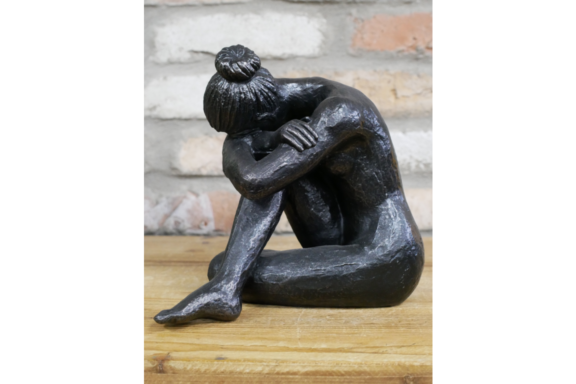 Statue Of Sitting Woman in aged antique black/bronze