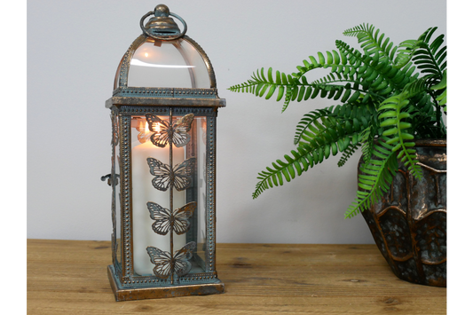 Elegant Narrow Glass and Metal Butterfly Lantern with Intricate Design for Home Decor