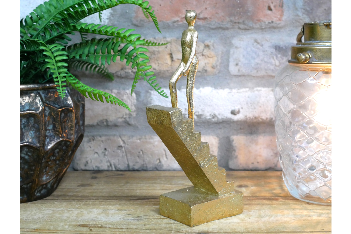 Walking The Stairs Statue In Gold - Elegant Decorative Figurine for Home & Office Decor