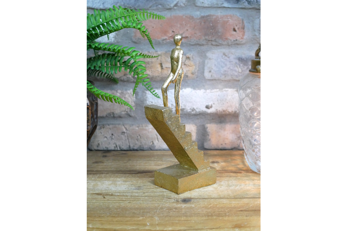 Walking The Stairs Statue In Gold - Elegant Decorative Figurine for Home & Office Decor