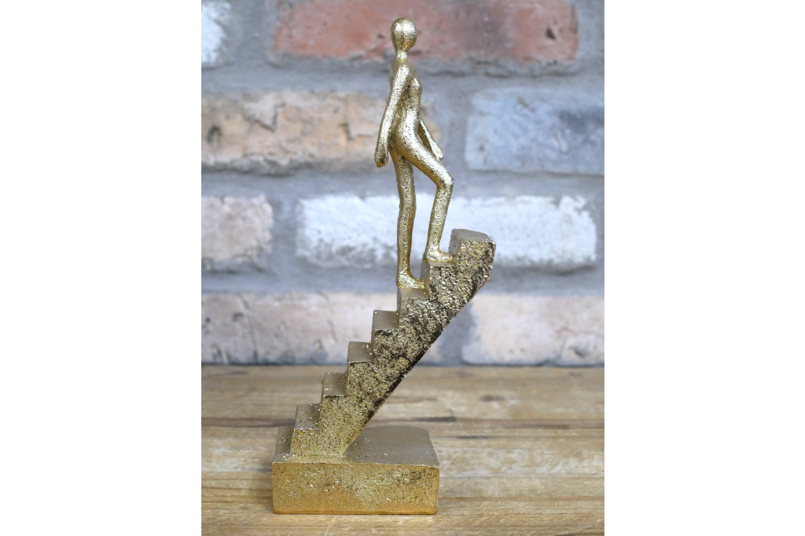 Walking The Stairs Statue In Gold - Elegant Decorative Figurine for Home & Office Decor