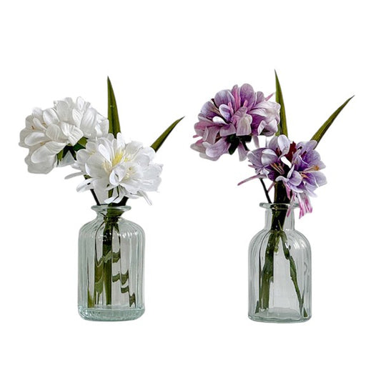 White Floral Display In Clear Glass Ribbed Jar 21cm
